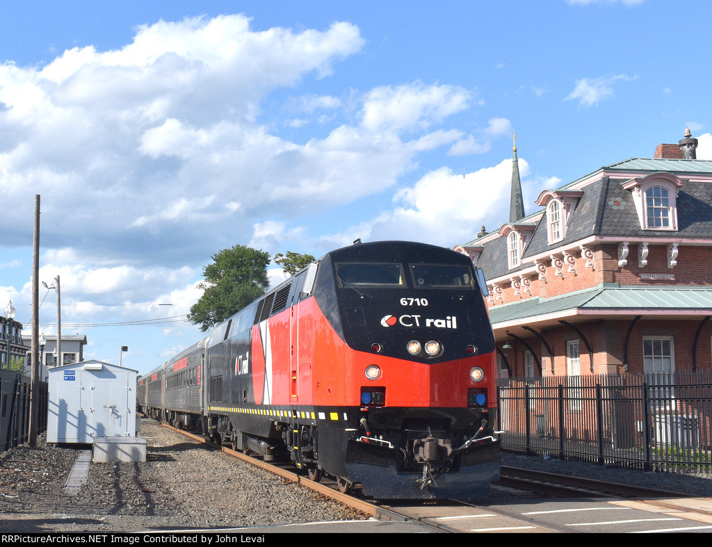 The 6710 leads Ctrail Train # 4461 past the former Wallingford New Haven RR and Amtrak Station